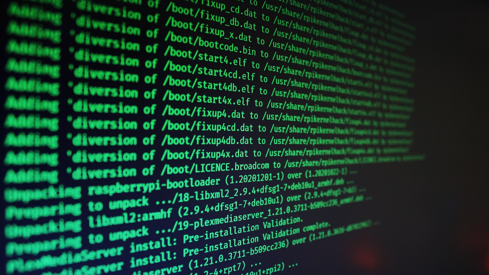 A terminal window showing an automated software installation running, green text on black